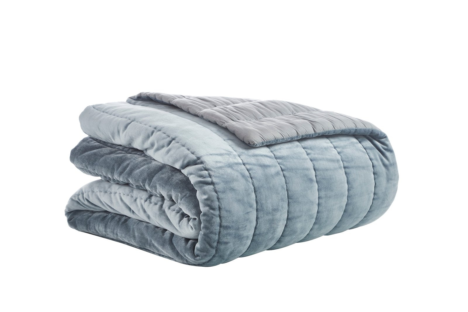 QT-360-11096_5|Folded blue velvet channel quilt, offering luxurious softness and cozy comfort. Perfect for stylish bedroom layering.
