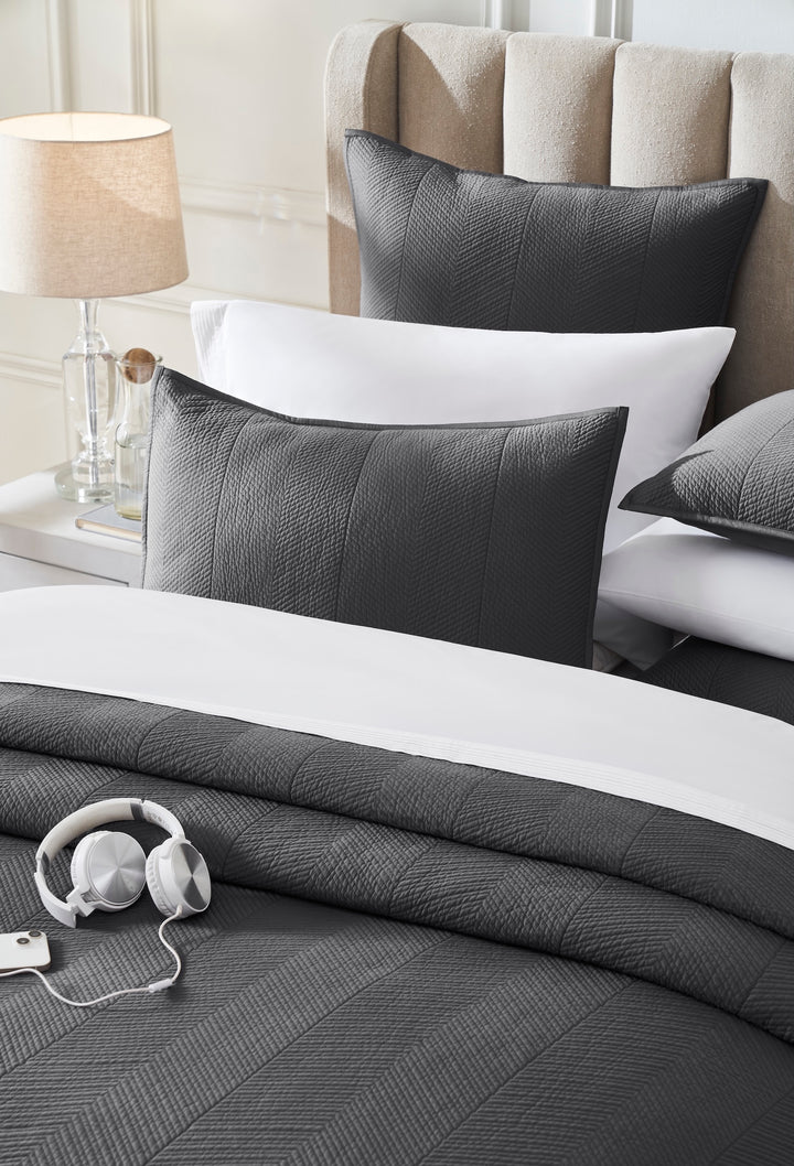 CL-263-11096_4|Luxurious charcoal grey quilted coverlet with a distinctive herringbone pattern, ideal for a chic and cozy bedroom.
