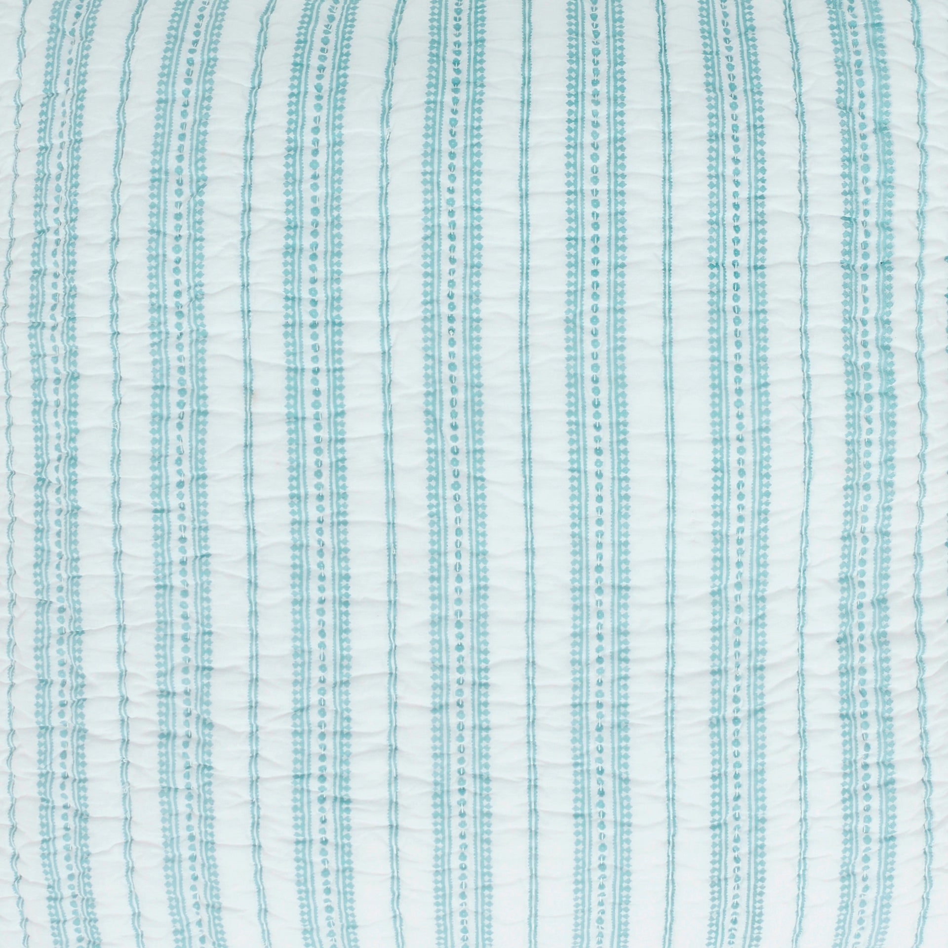 SWT-347-7.8_1|Quilted white and light blue striped fabric with delicate dot accents, perfect for tranquil bedding and serene textile products.
