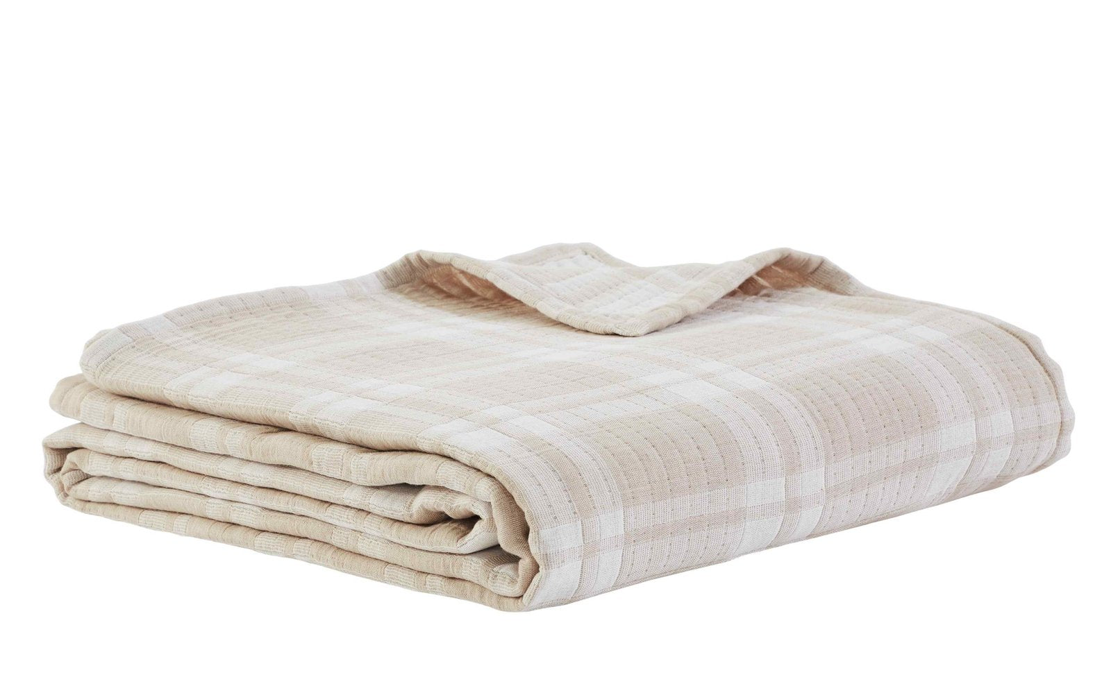 BT-118-11096_3|Neatly folded soft beige and white plaid textured cotton blanket, ready for storage or cozy use on a cool evening.
