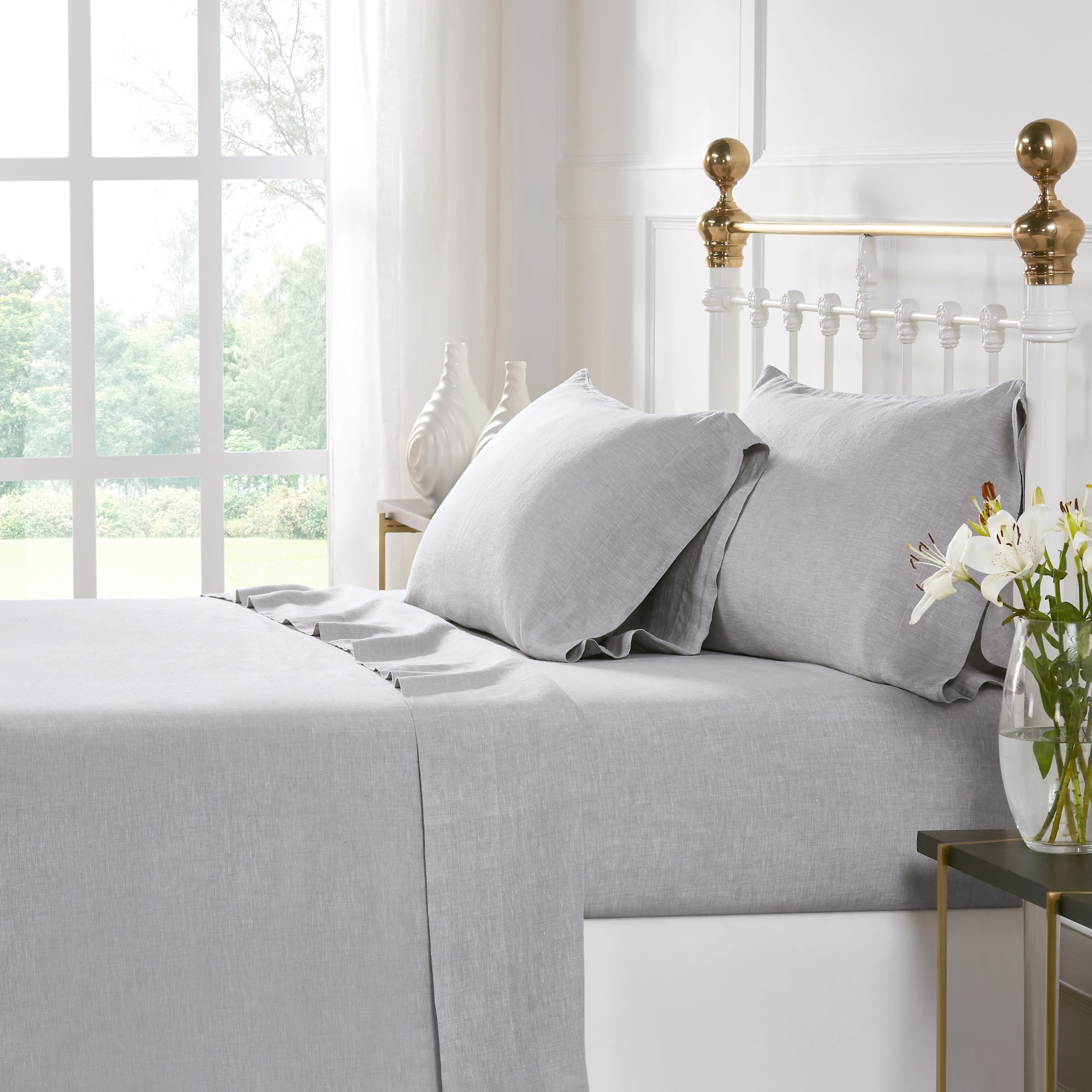 QSS-516-6080_1|Stylish light grey 100% linen sheets on a contemporary bed, providing breathable comfort and a modern, serene aesthetic.