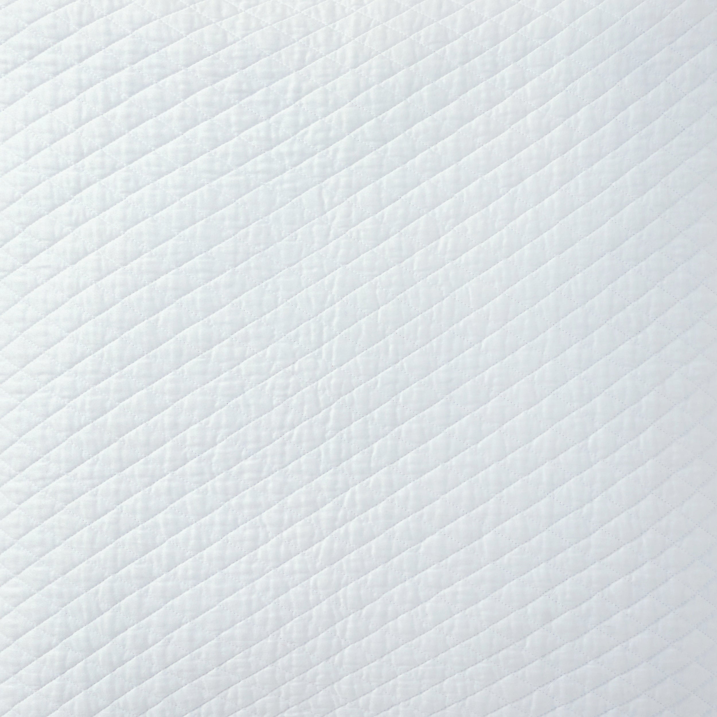 ES-264A-2626_2|Crisp white quilted coverlet with diagonal stripe pattern. Clean, soft bedding for a serene and inviting bedroom aesthetic.
