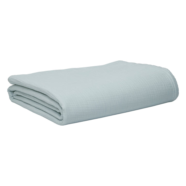 BL-863-11096_6|Neatly folded luxurious light blue textured muslin blanket, a clean product shot perfect for retail display.