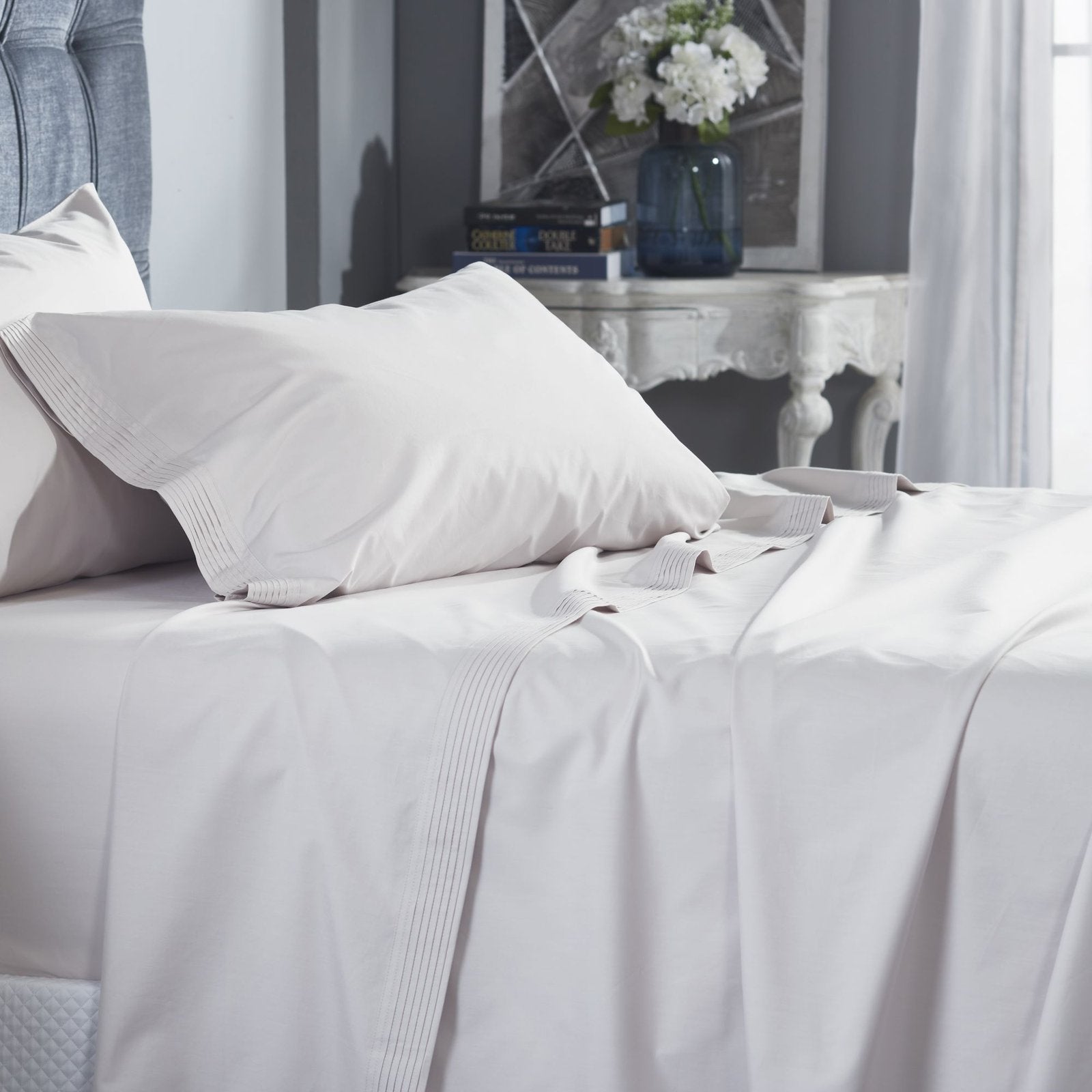 CSS-523-7284_4|Elegant light grey 100% cotton sheets on a bed, enhancing the cozy bedroom decor. Soft, breathable, and luxurious pure cotton.