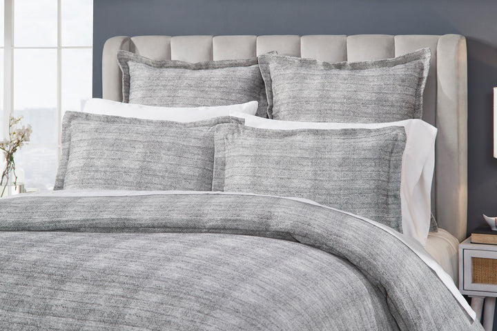 DT-034-10692_3|Detailed close-up of a stylish grey textured duvet cover and matching shams, perfect for modern bedrooms.