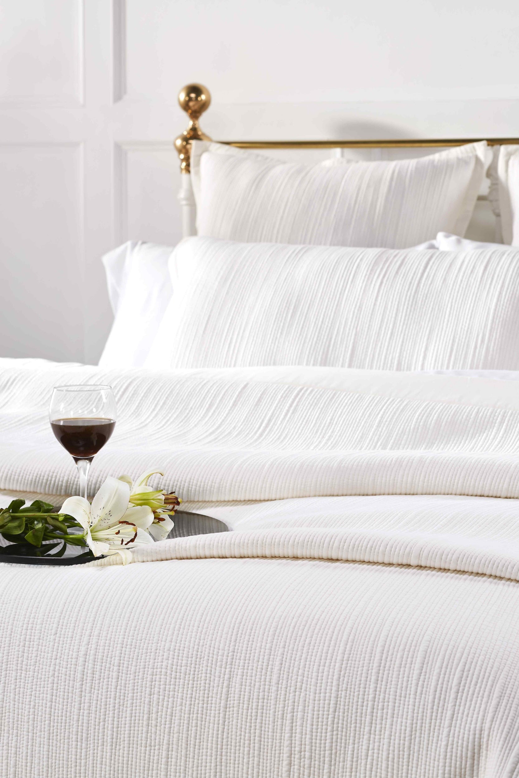 CL-168-11096_3|Close-up of white textured coverlet with subtle stripe pattern, luxurious bedding for a serene bedroom retreat.
