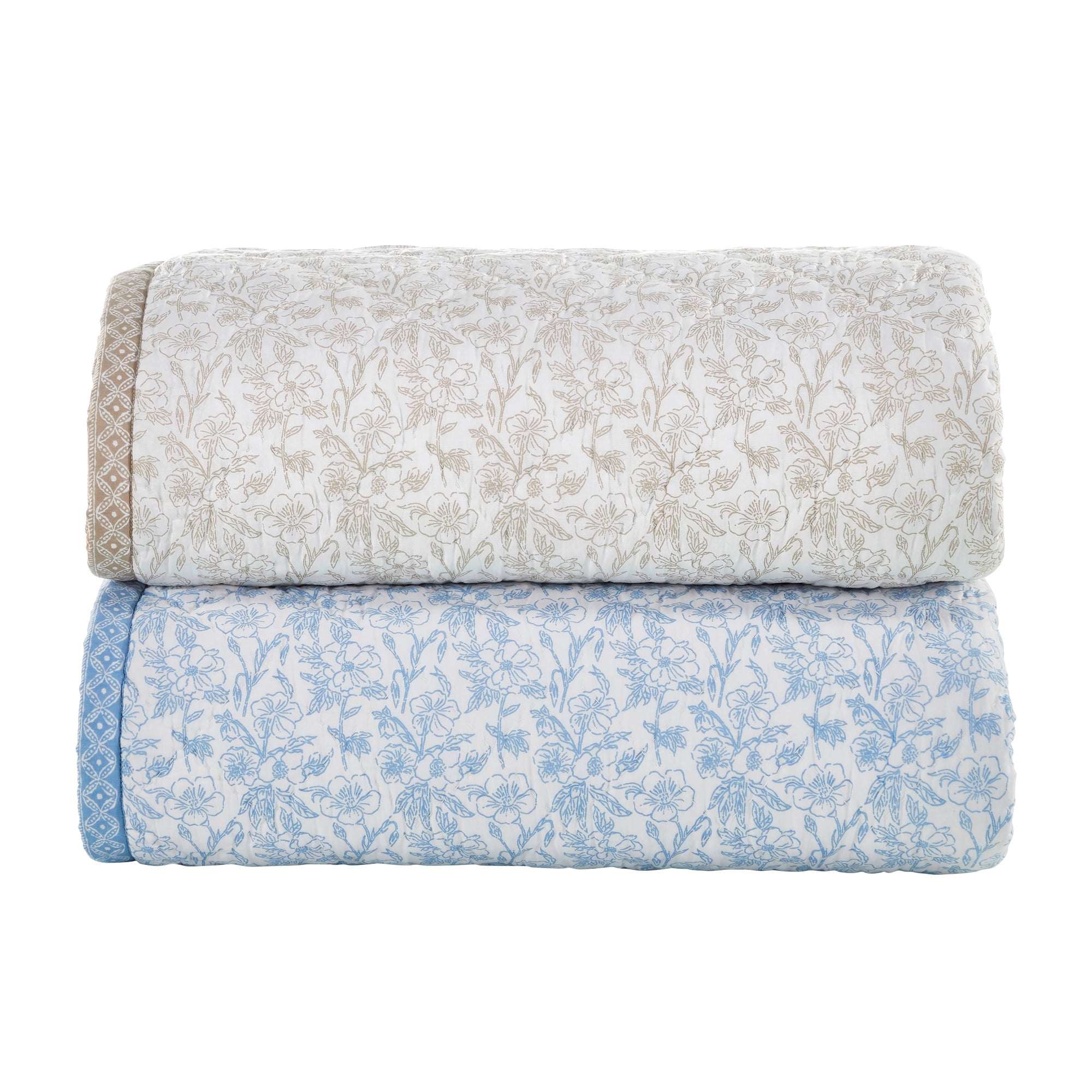 QT-346-11096_8|Stacked beige and blue floral print quilts, neatly rolled. These soft, patterned bedspreads offer comfort and style for any bedroom decor.