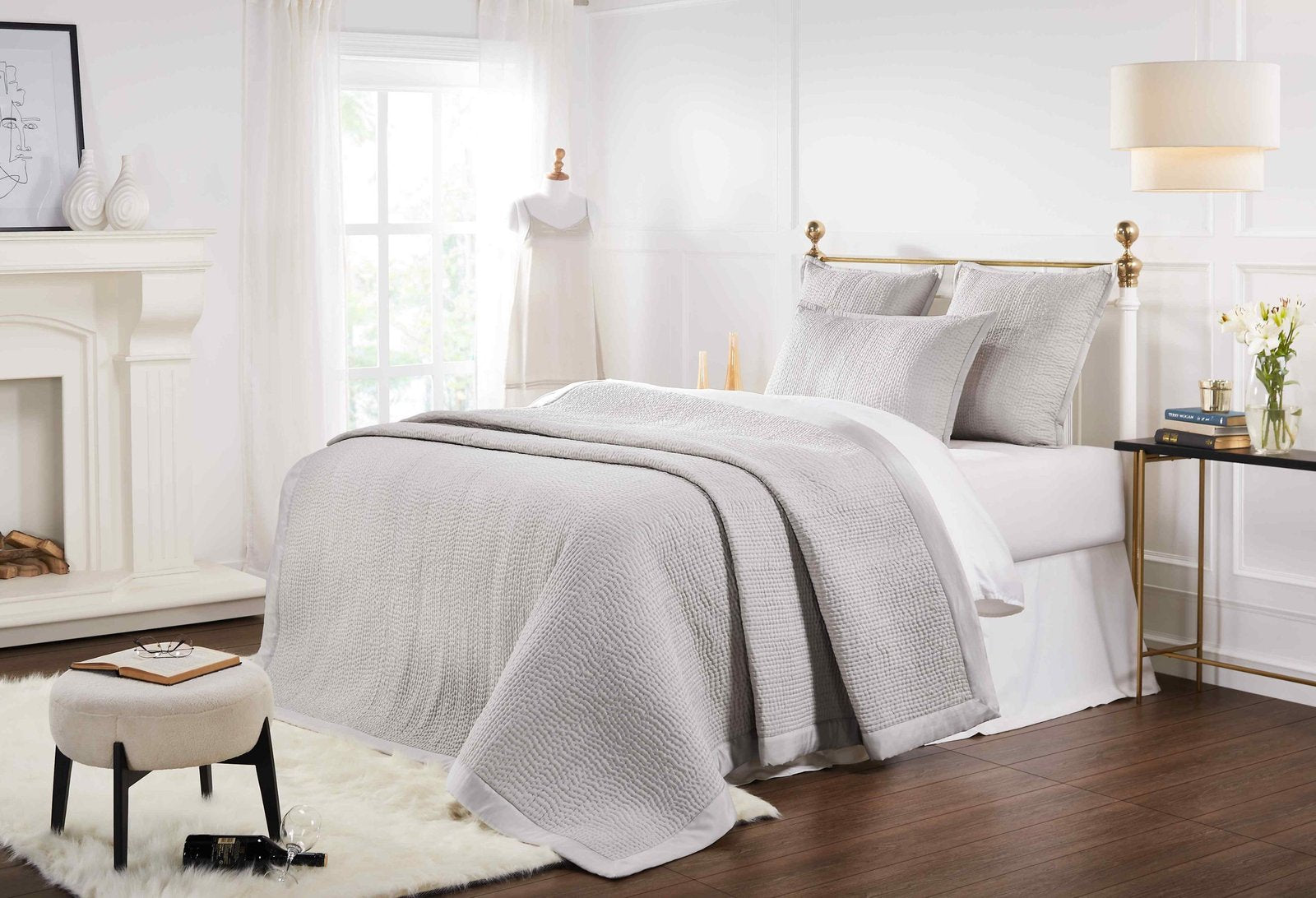 CL-166-11096_2|Light grey quilted coverlet featuring a small, irregular waffle-like quilting pattern and clean finish. Bed setting.