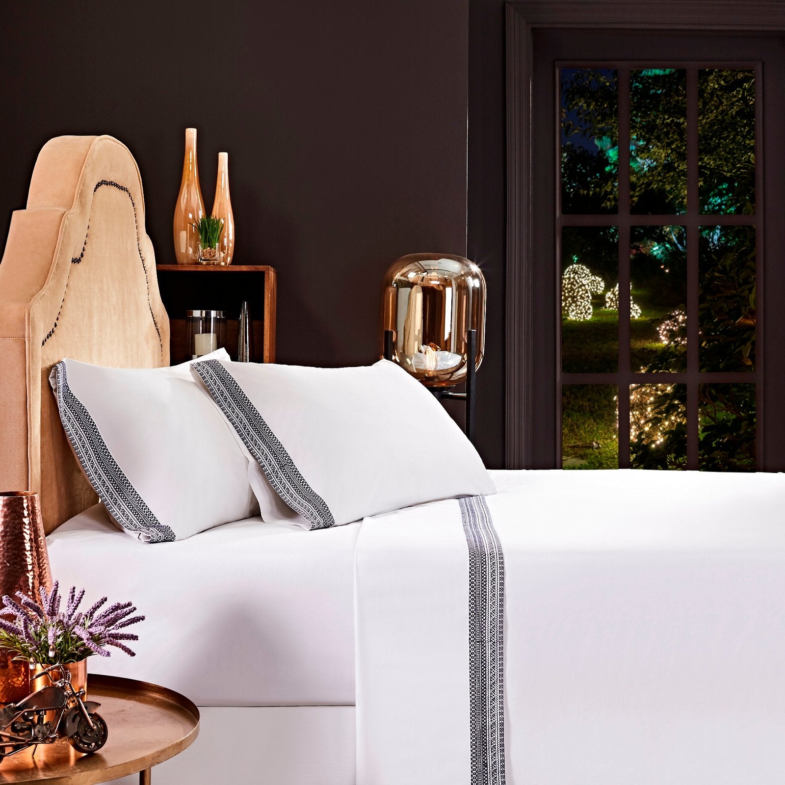 QSS-503-6080_1|Elegant white 100% cotton sheet set with navy blue embroidered border, enhancing a luxurious bedroom decor.