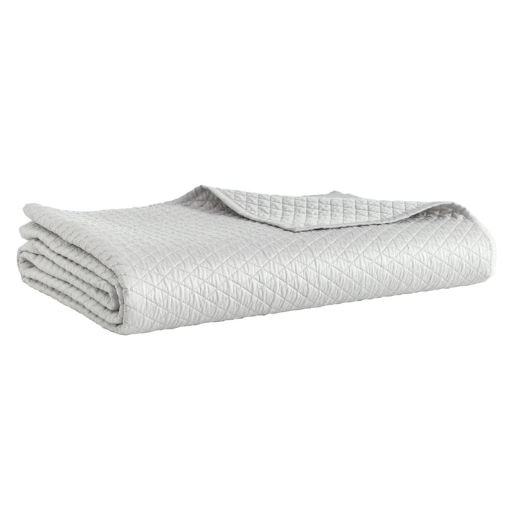 CL-266-11096_5|Neatly folded light gray diamond quilted coverlet, showcasing its elegant pattern. Premium quality and soft, modern bedding.
