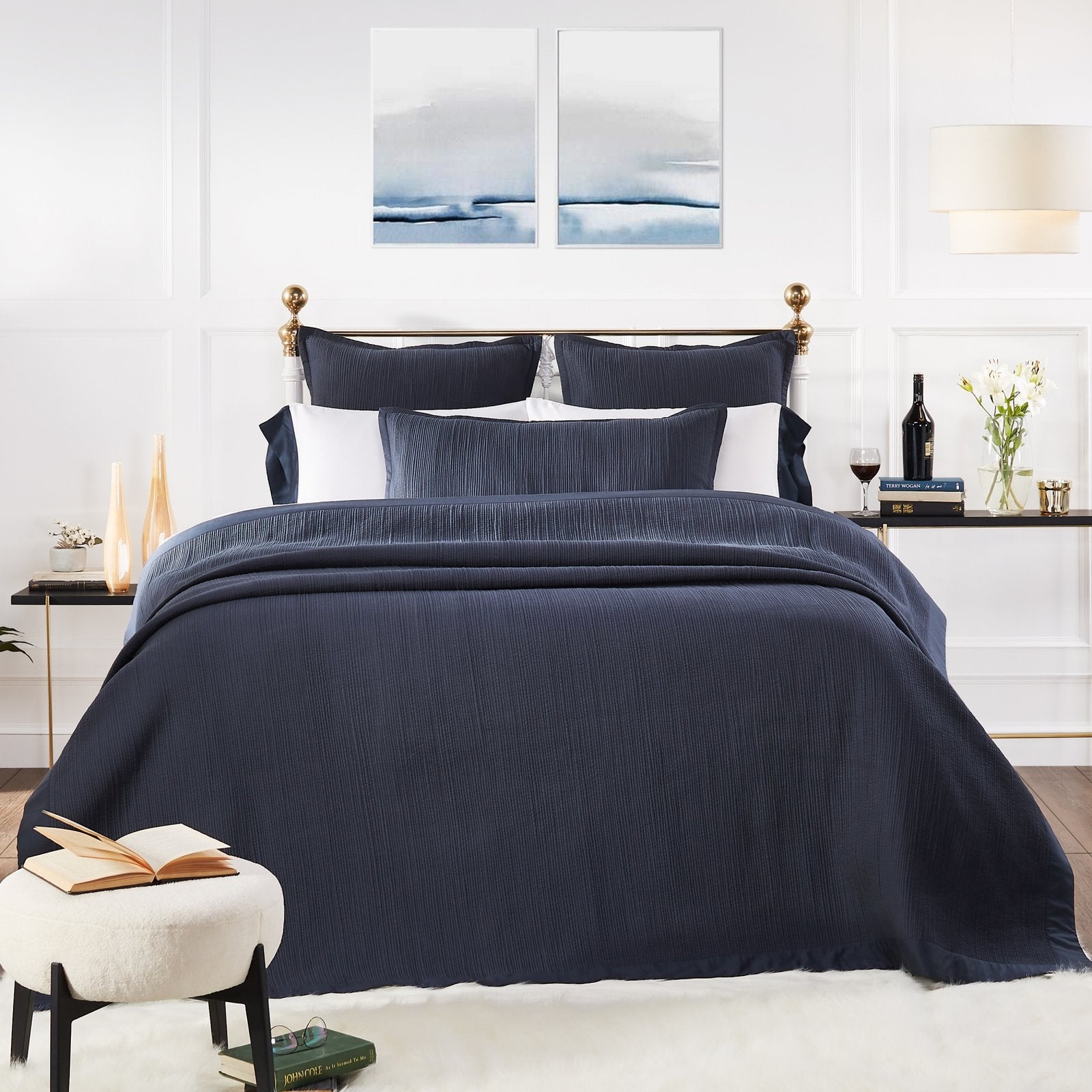 CL-167-11096_1|Rich navy blue textured coverlet with matching shams on a luxurious bed, enhancing bedroom comfort and style.