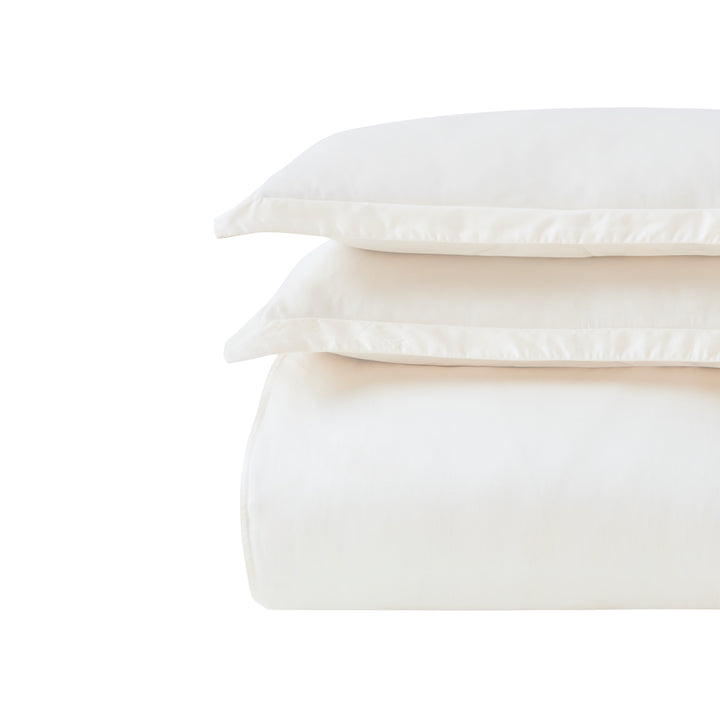 DT-046-9092_6|Stacked elegant cream soft cotton duvet cover with matching pillowcases, a comfortable and classic bedding set essential.