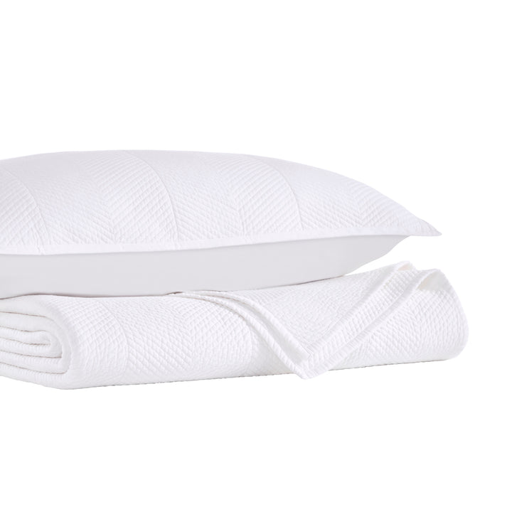 CL-170-9496_9|Elegant white chevron coverlet and matching pillow. Premium textured bedding for a luxurious and serene bedroom aesthetic.