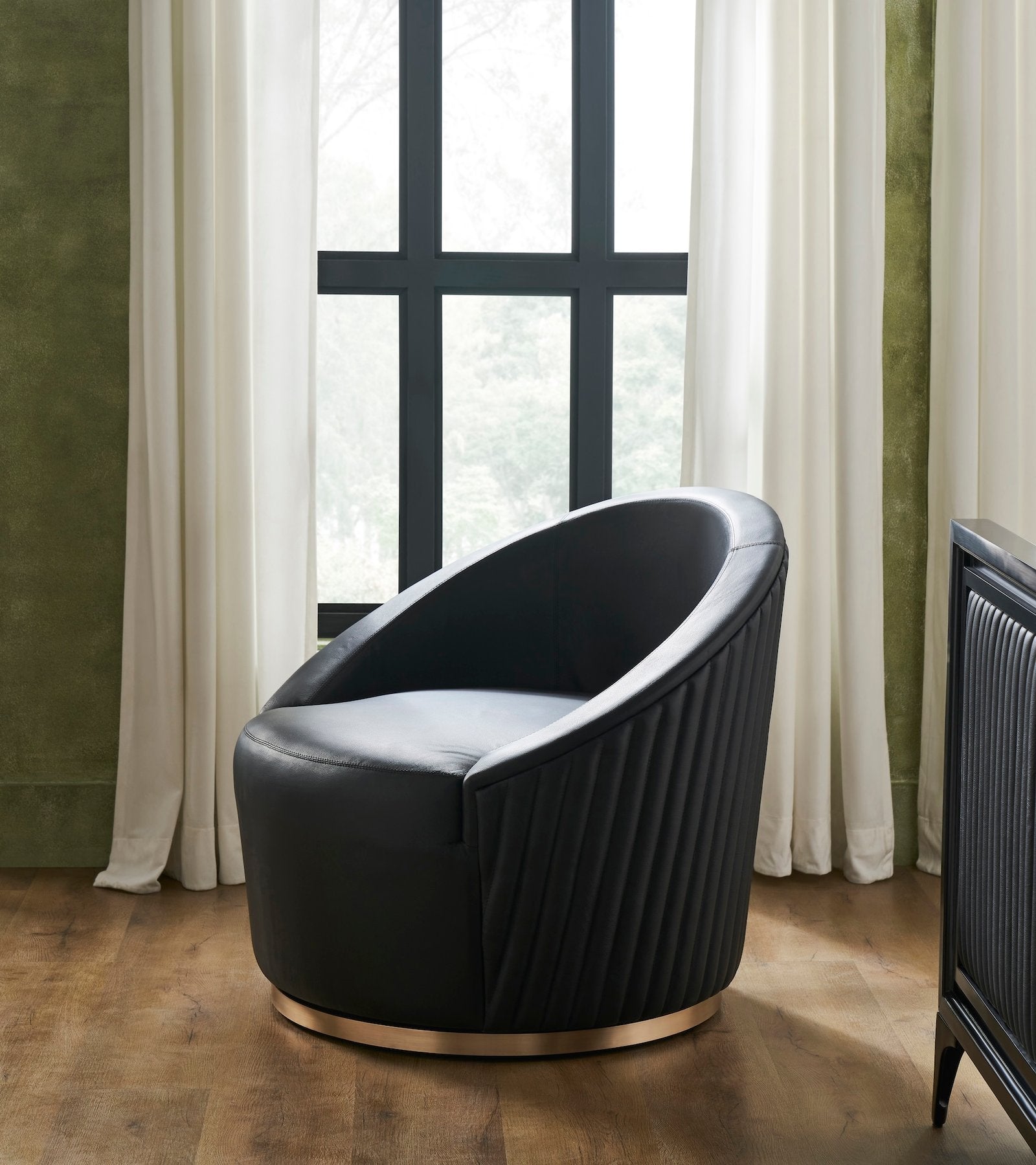 FN-5206-X_1|Luxurious black faux leather swivel accent chair, featuring a stylish fluted back and gleaming gold base for modern living rooms.