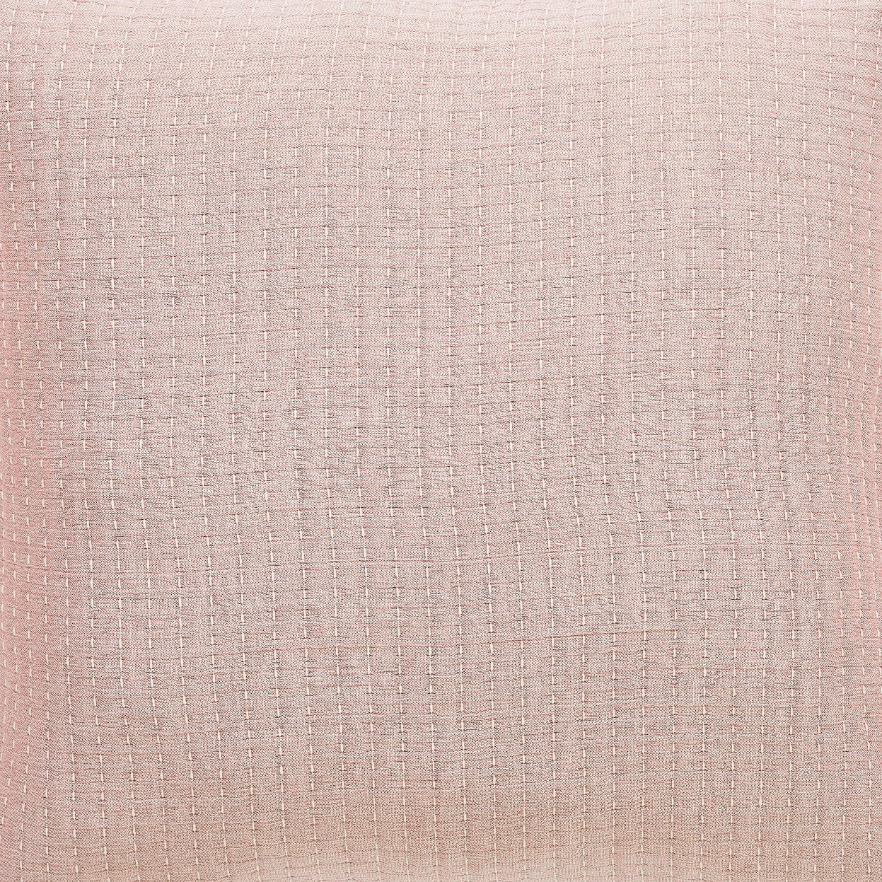 TP-105-1440_2|Light pink fabric pillow cover with a fine textured weave. Displays a subtle, uniform grid pattern throughout the material.