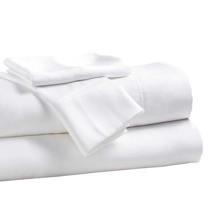 KFL-509-7880_4|Stack of folded white 100% Lyocell sheets, displaying the smooth, soft texture and a wide, sewn hem on the top sheet.