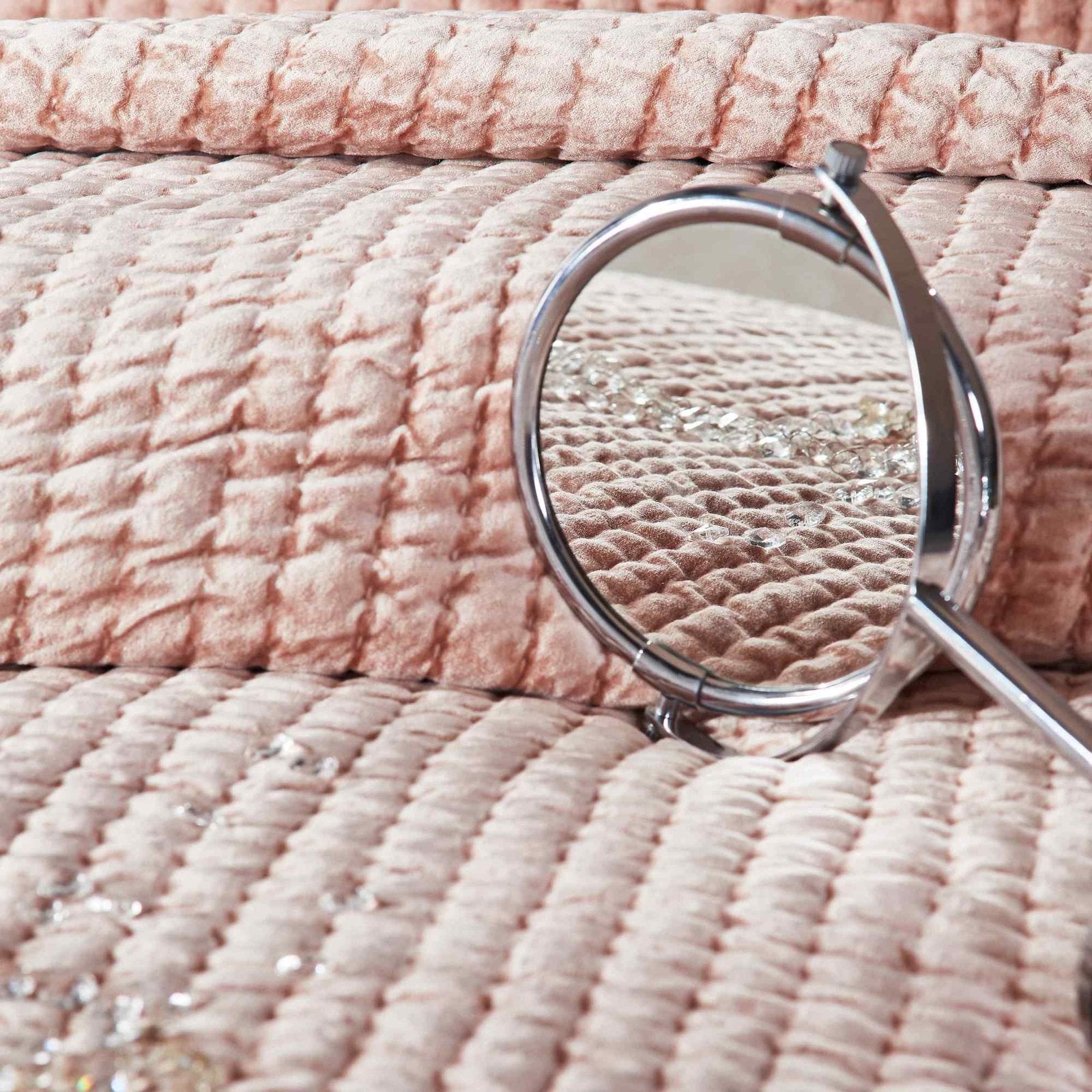 QT-354-9496_6|Detail of dusty pink velvet channel-quilted quilt texture. Soft, luxurious bedding, perfect for a cozy modern room.