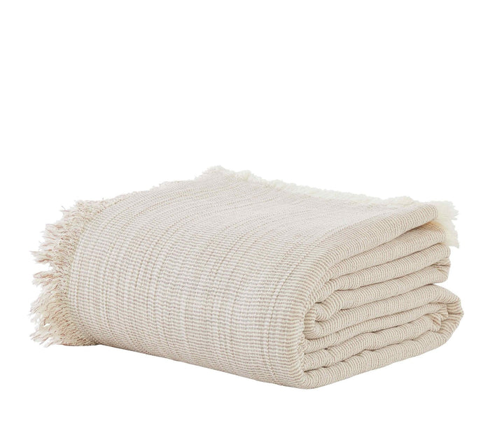 BT-112-9496_2|Neatly folded beige fringed gauze throw blanket, showcasing its soft texture and stylish fringe details for comfort.