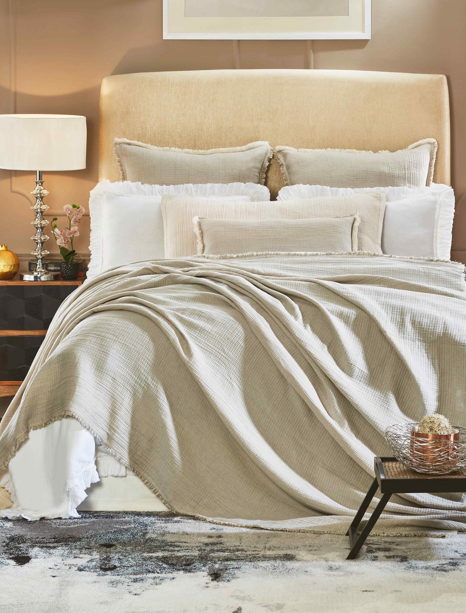 BT-102-11096_4|Elegant light grey textured blanket draped gracefully over a bed, creating a serene and sophisticated bedroom ambiance.