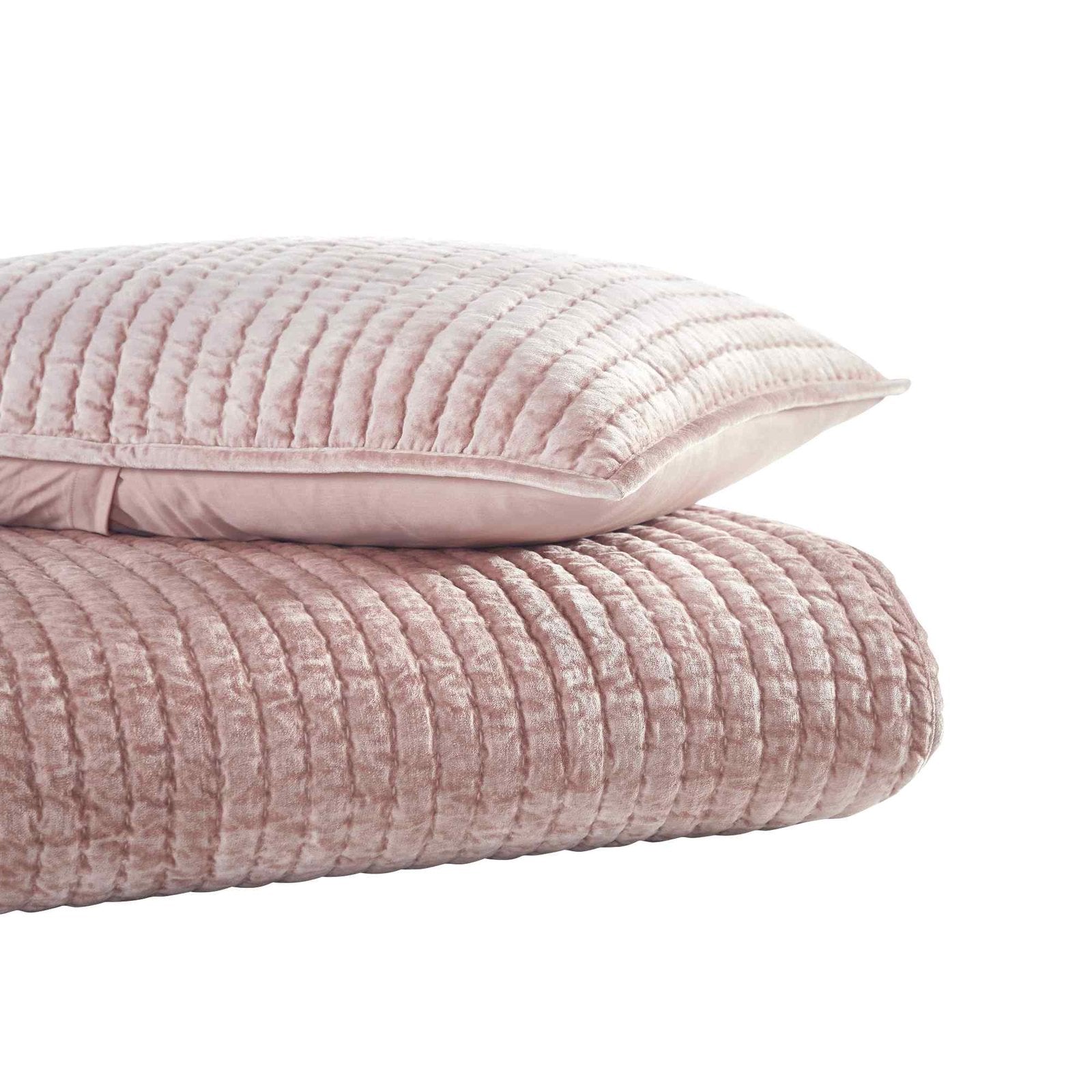 QT-354-9496_2|Stack of plush dusty pink velvet quilt and matching pillow sham. Channel-quilted texture, luxurious cozy bedding set.