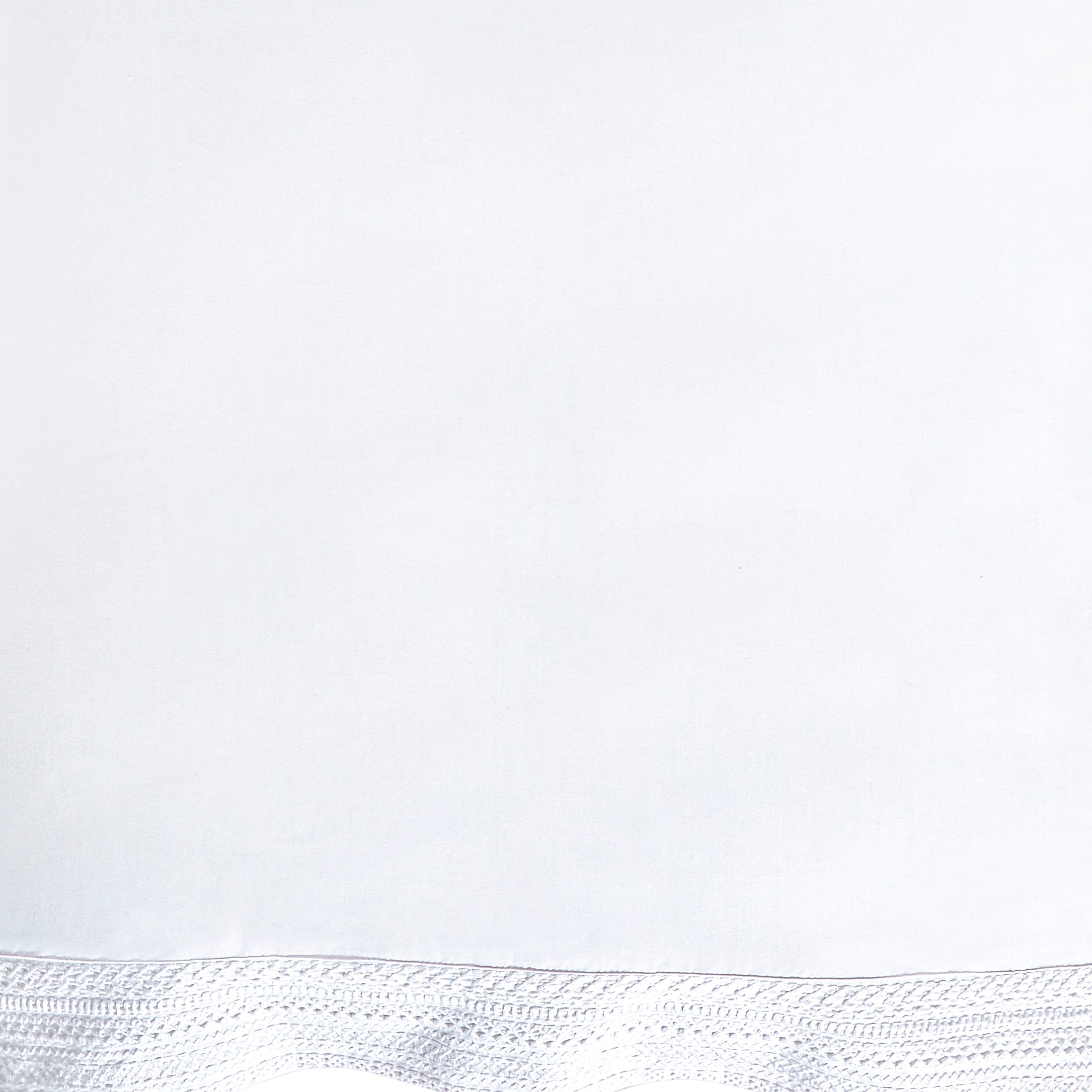 SWT-520-7.8_1|Crisp white premium fabric with delicate white lace trim detail, ideal for elegant bedding and sophisticated home accents.