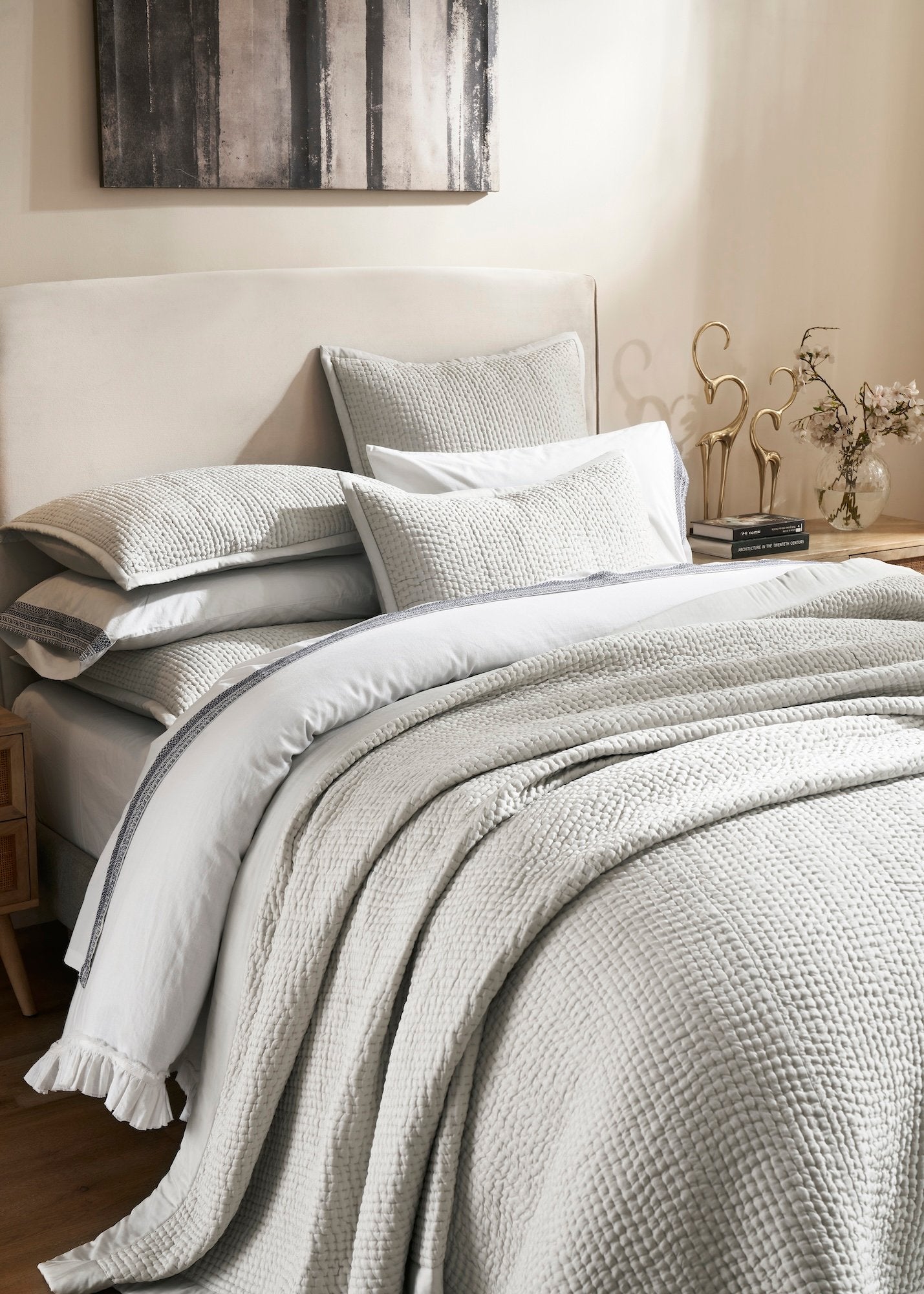 CL-197-11096_3|Close-up of a soft light grey quilted coverlet, showcasing its intricate waffle texture and inviting comfort for bedding.