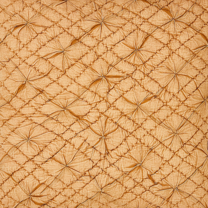 SWT-364-7.8_1|Rich golden-tan quilted fabric with unique raised puff diamond pattern, adding plush texture for luxurious home decor.