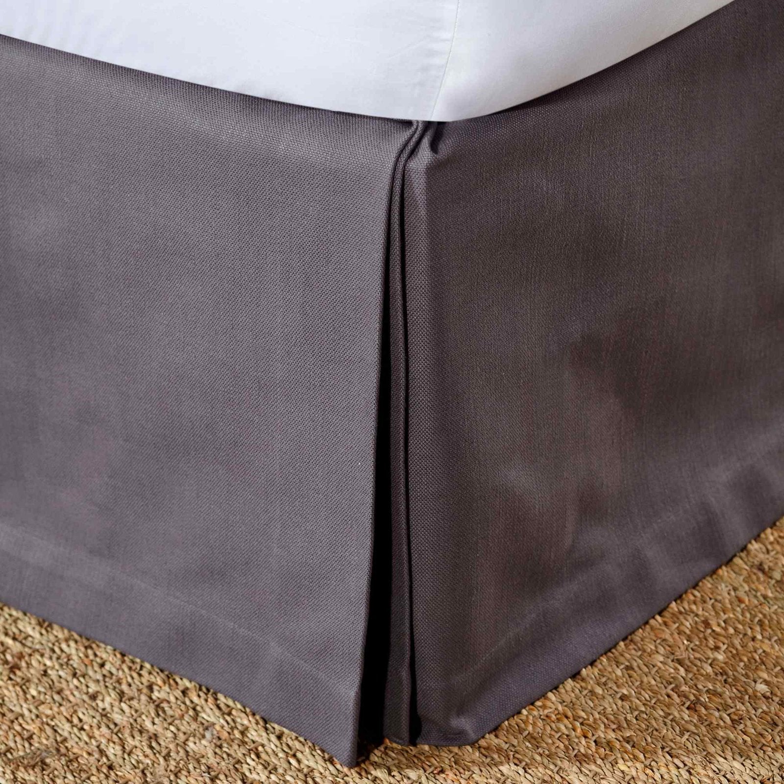 BS-107-7880_1|Elegant dark grey panel bed skirt with pleated corners, adding a tailored finish to bedroom decor. Conceals under-bed storage beautifully.