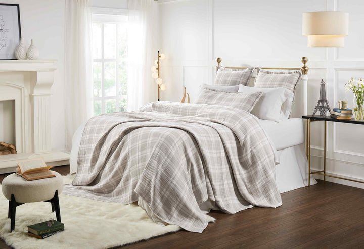 BT-120-11096_5|Stylish bedroom featuring a soft beige and white plaid blanket draped over a bed, creating a tranquil sleeping space.