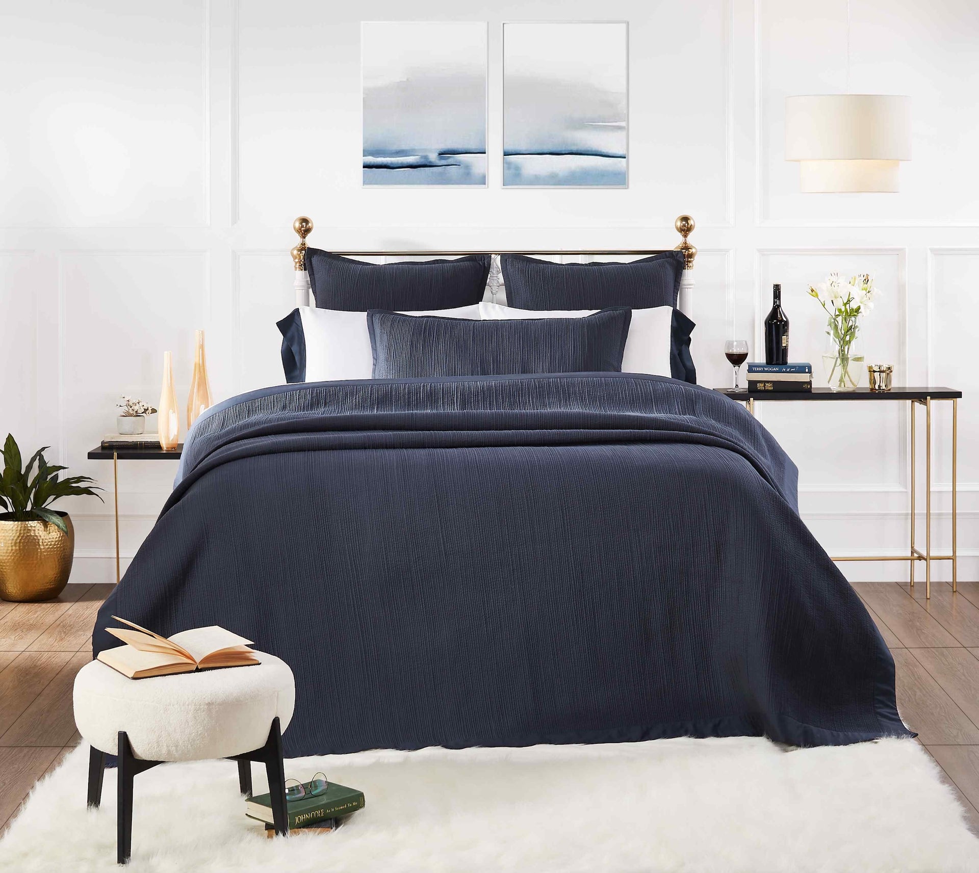 CL-158-X_1|Luxurious navy blue textured coverlet on a queen bed, complete with matching shams, offering elegant bedroom comfort.