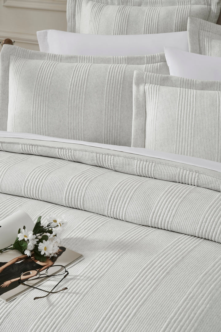 DT-043-9092_4|Close-up of light grey ribbed texture duvet cover, shams, and pillows, showcasing premium soft bedding details.