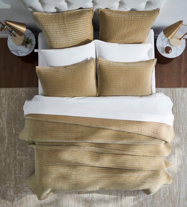 CL-267-9496_4|Overhead view of a cozy gold quilted velvet coverlet creating a lavish bedding ensemble, perfect for a refined bedroom.