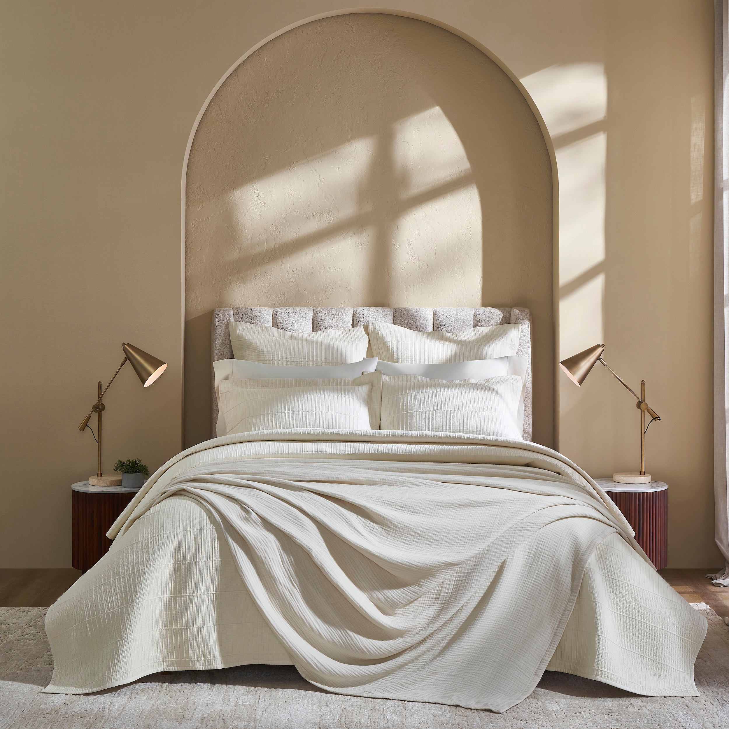 CL-271-9496_6|Luxurious cream textured coverlet with subtle grid pattern, draped elegantly on a bed, offering sophisticated comfort for modern bedrooms.
