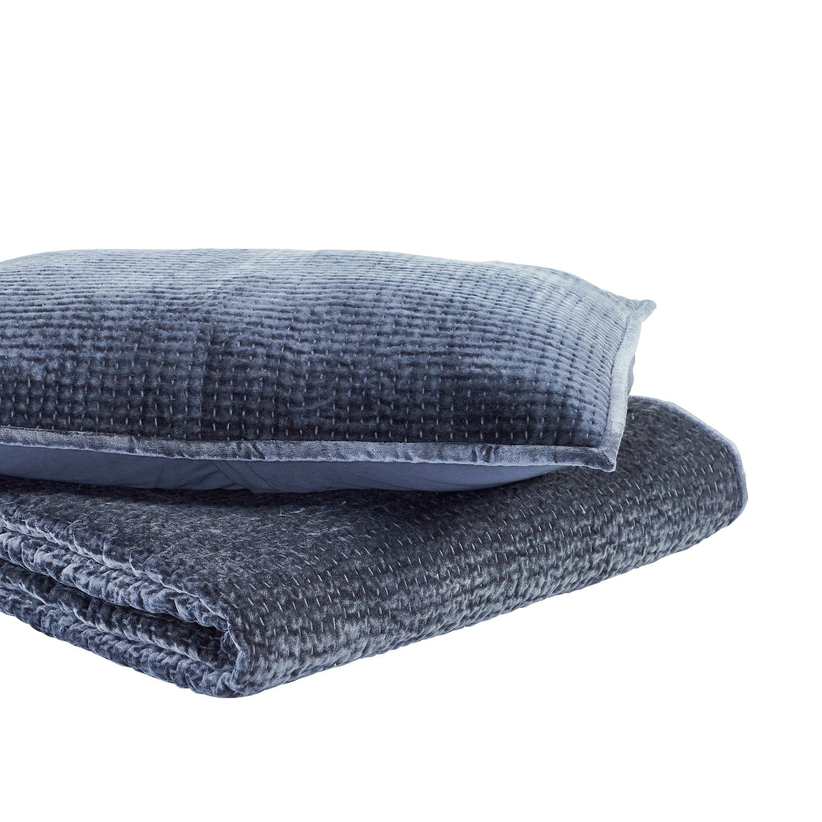 CL-195-9496_5|Folded navy blue textured quilted coverlet with a matching pillow, isolated for versatile bedding and home decor styling.