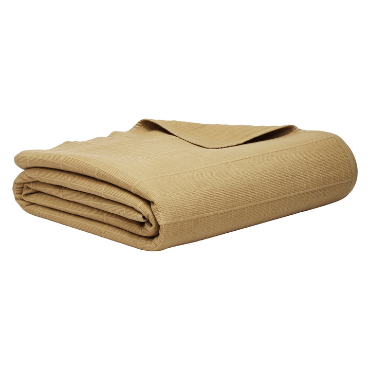 CL-269-11096_9|Folded tan coverlet featuring a distinctive grid-like textured pattern, ideal for versatile bedroom layering.