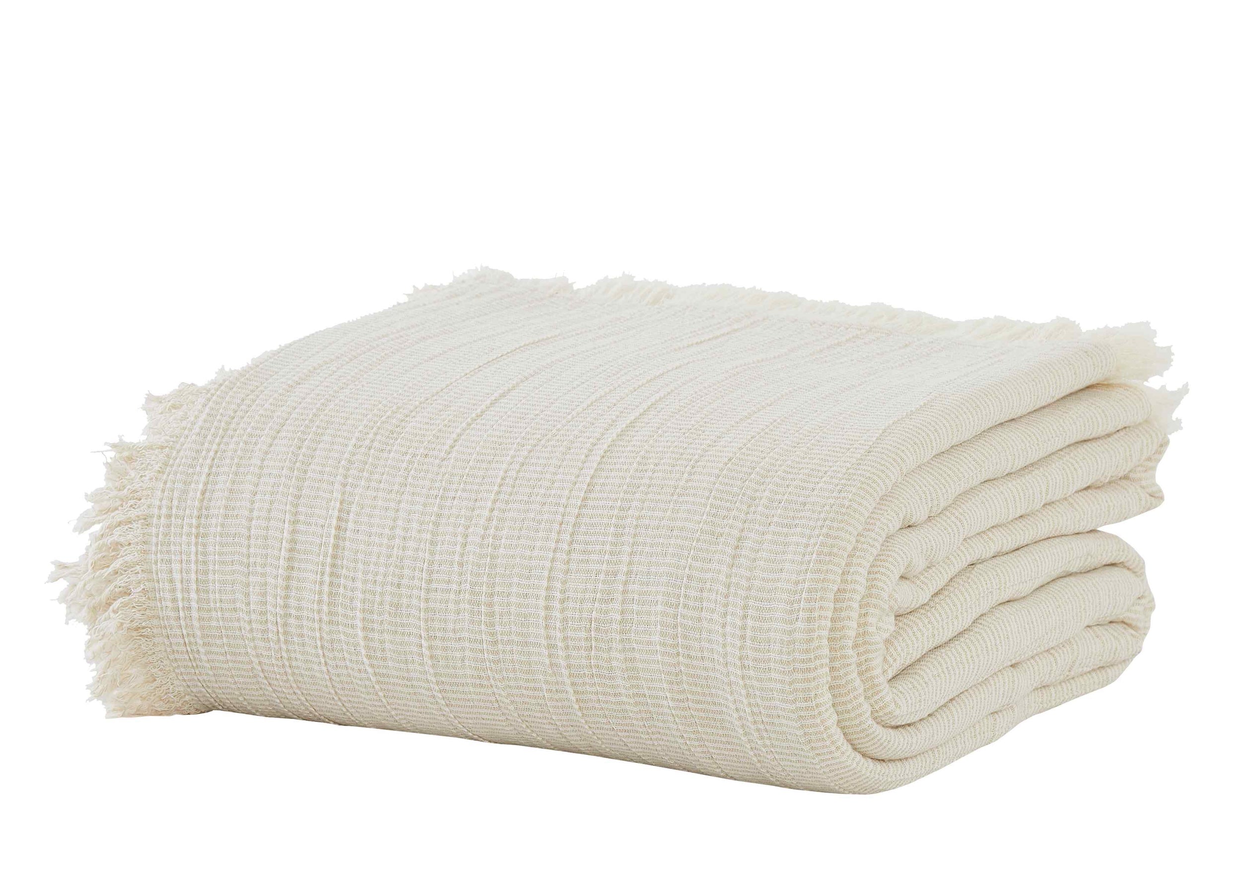 BT-115-9496_3|Neatly folded light cream textured cotton blanket with fringed edges, perfect for cozying up your living space.