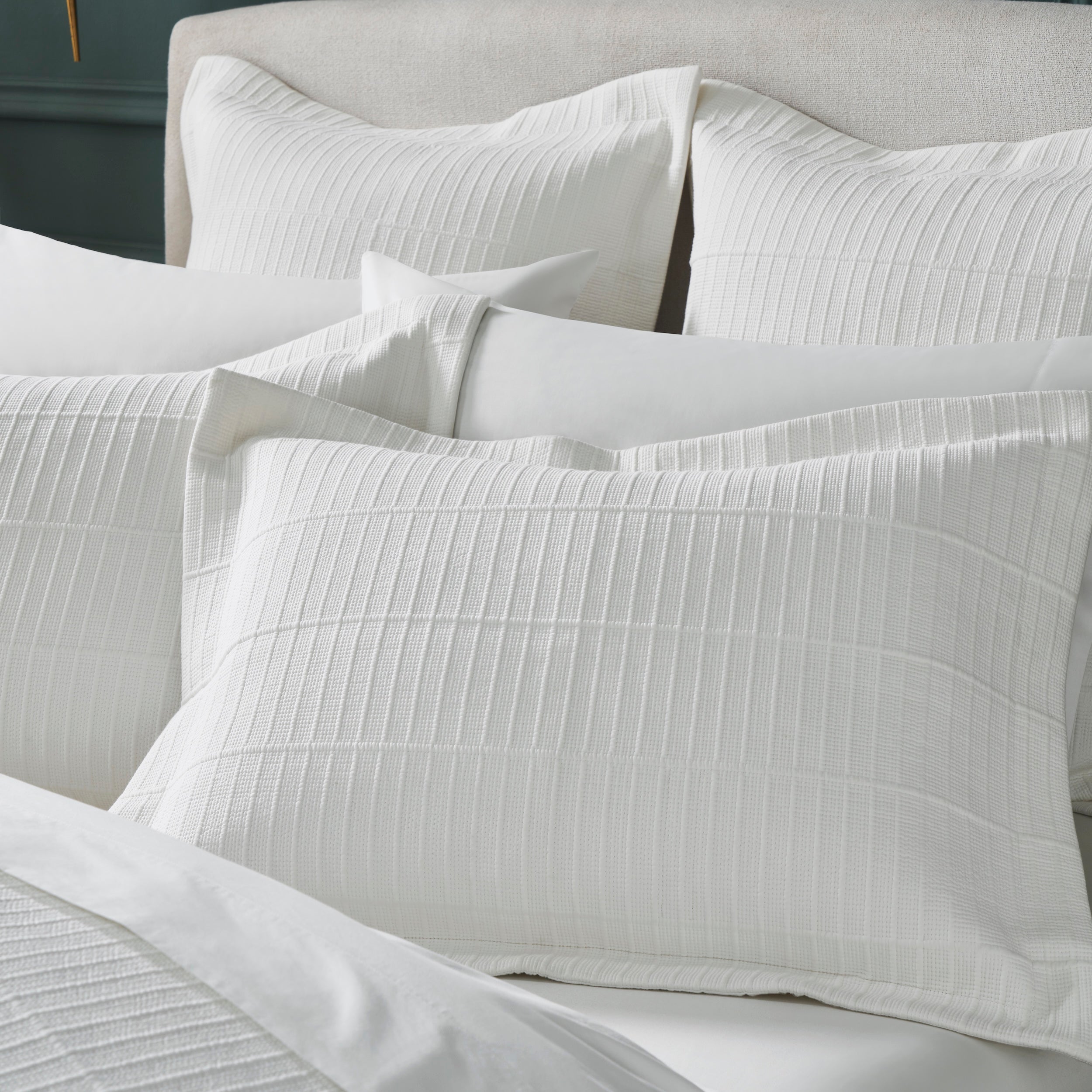 SS-268-2026_3|Elegant white textured coverlet with a sophisticated ribbed pattern, providing subtle depth and luxurious comfort for contemporary beds.