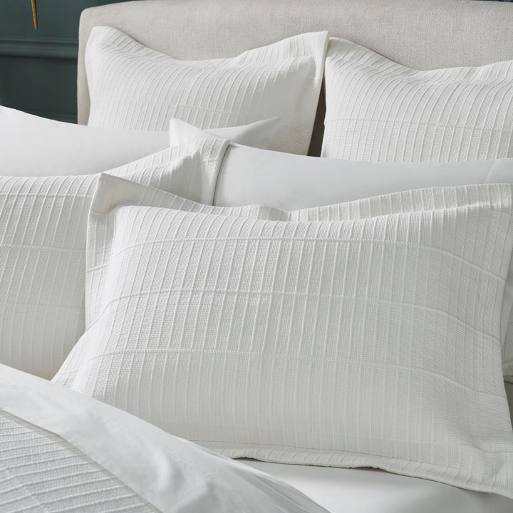 SS-268-2026_3|Elegant white textured coverlet with a sophisticated ribbed pattern, providing subtle depth and luxurious comfort for contemporary beds.