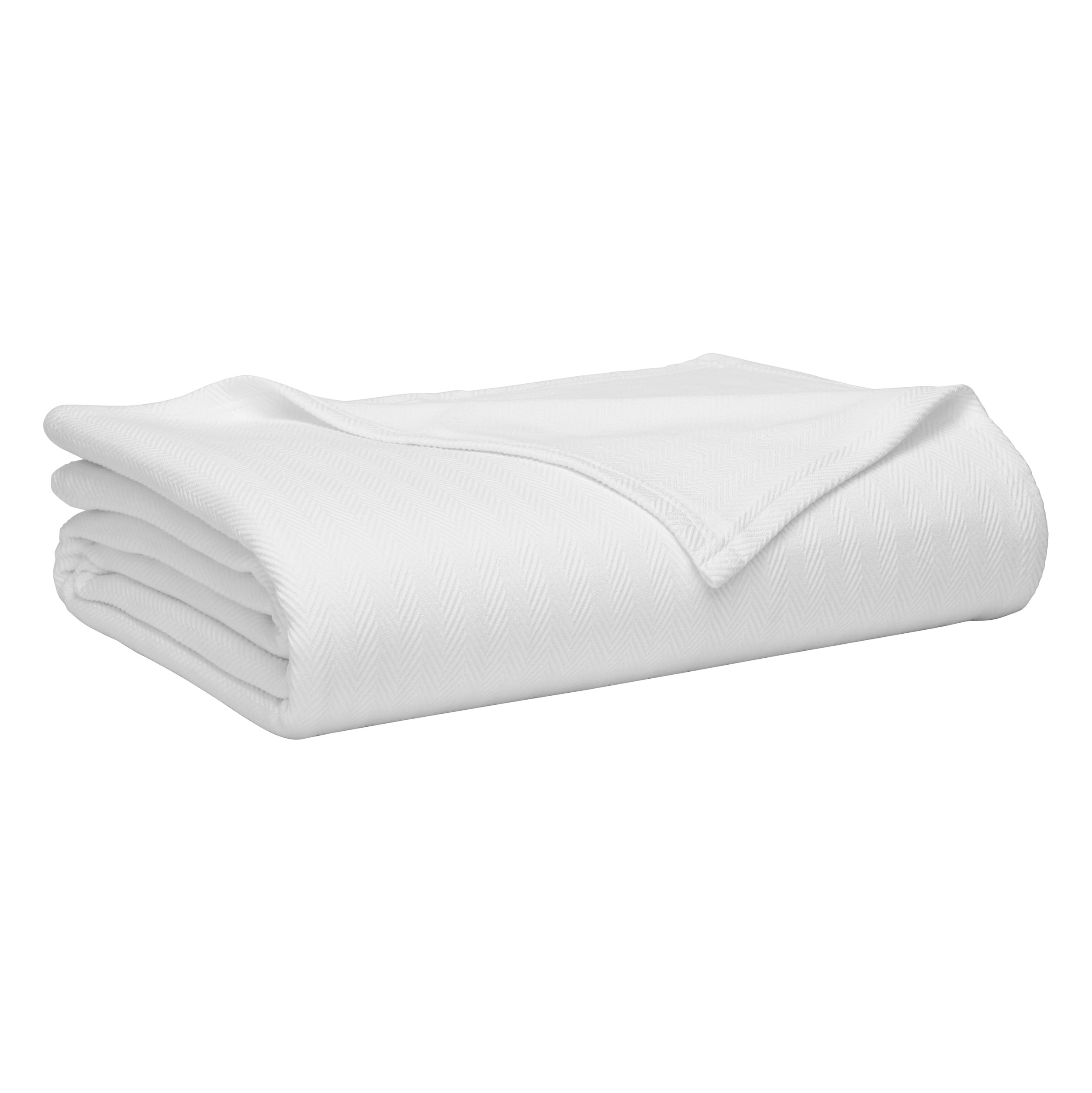BL-865-9496_8|Elegant white herringbone textured blanket, artfully folded with a draped corner, offering luxurious comfort and style.