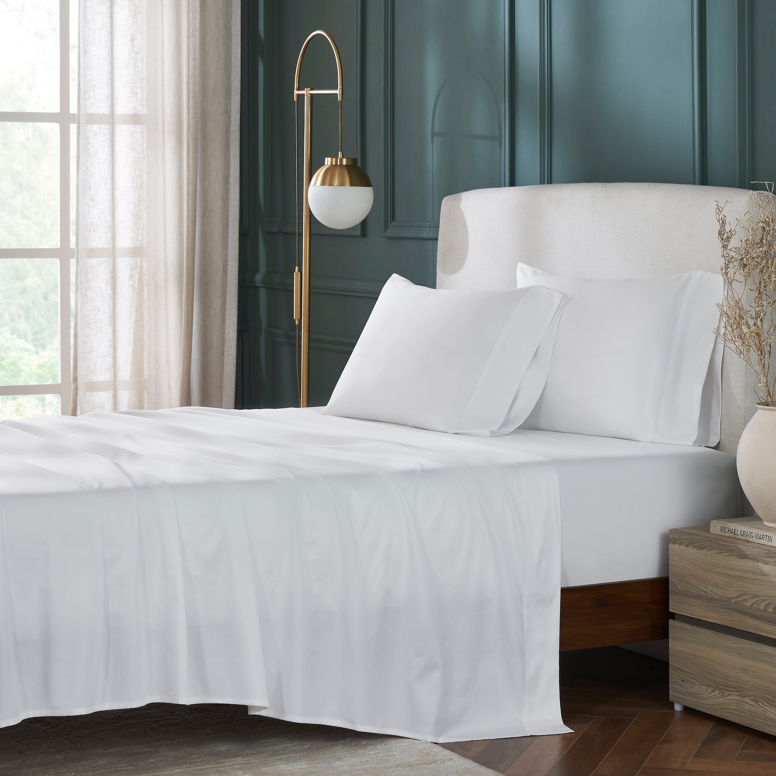 QSS-547-6080_1|Crisp white 100% cotton sheets on a neatly made bed, showcasing breathable and soft natural bedding for a luxurious feel.