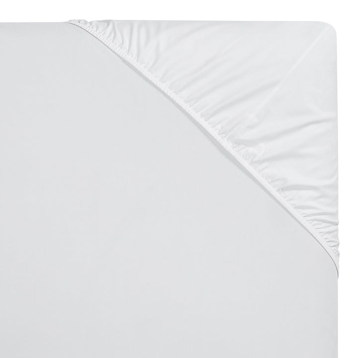 QSS-547-6080_5|Neatly folded set of pure white 100% cotton sheets with matching pillowcases, ready for a comfortable night.