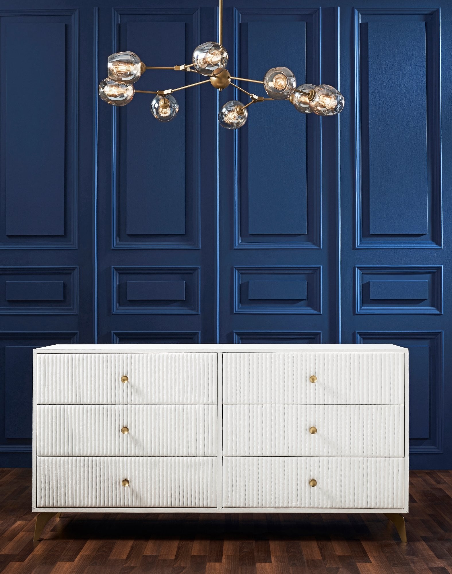 FN-5203-642033_2|Contemporary white six-drawer dresser with unique ribbed detailing and elegant brass knob pulls, perfect for any room.
