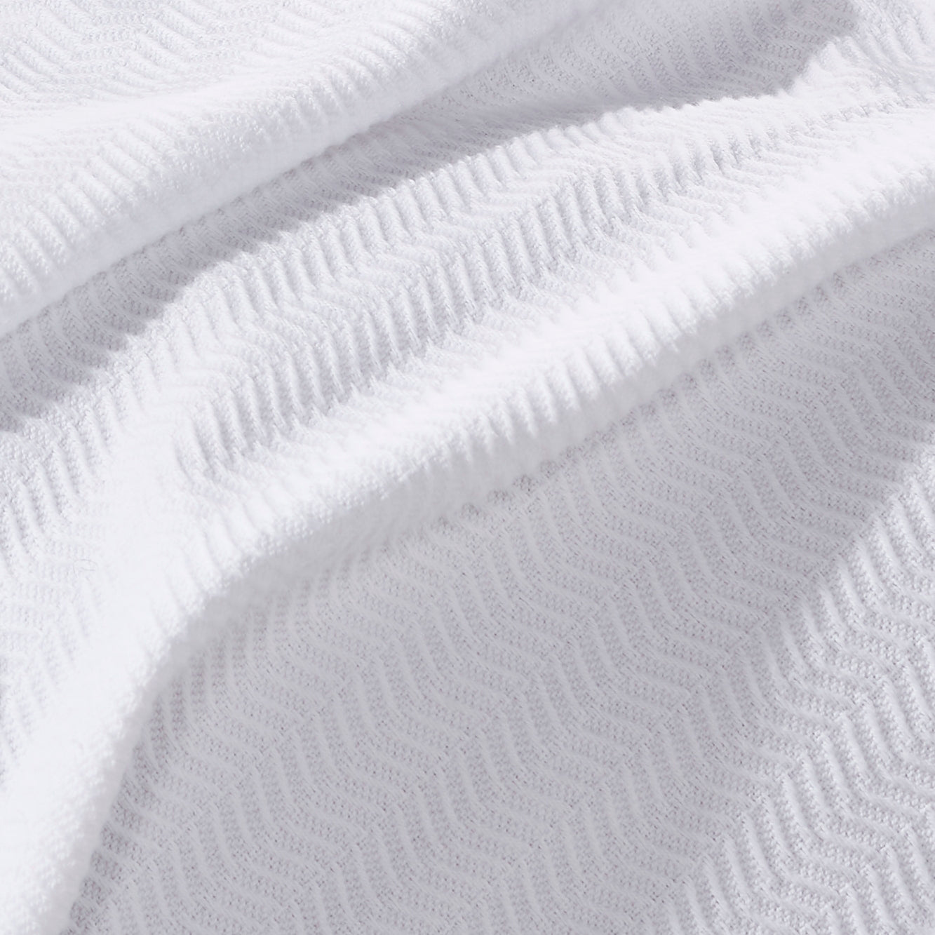 SWT-853-X_1|Luxurious white herringbone patterned blanket, super soft and cozy, perfect for adding texture and warmth to bedding.
