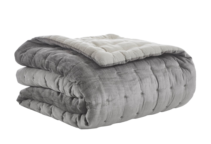 QT-307-9496_5|Reversible charcoal grey and beige tufted quilt, folded, showcasing square quilting. Versatile, cozy bedding for a comfortable bedroom.