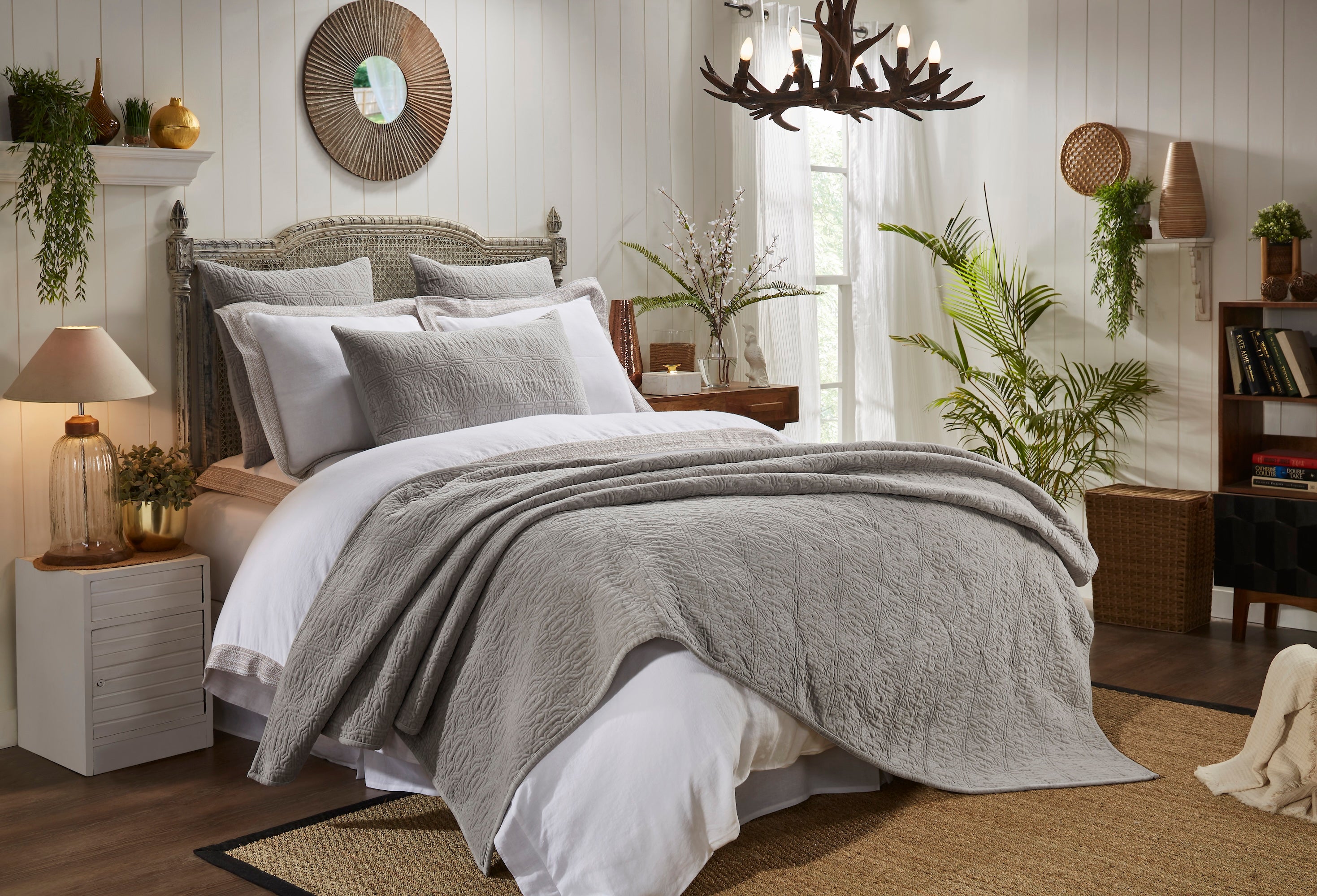 QT-331-9496_2|Stylish bedroom featuring a grey textured quilted quilt and shams over a crisp white bed, inviting and serene.
