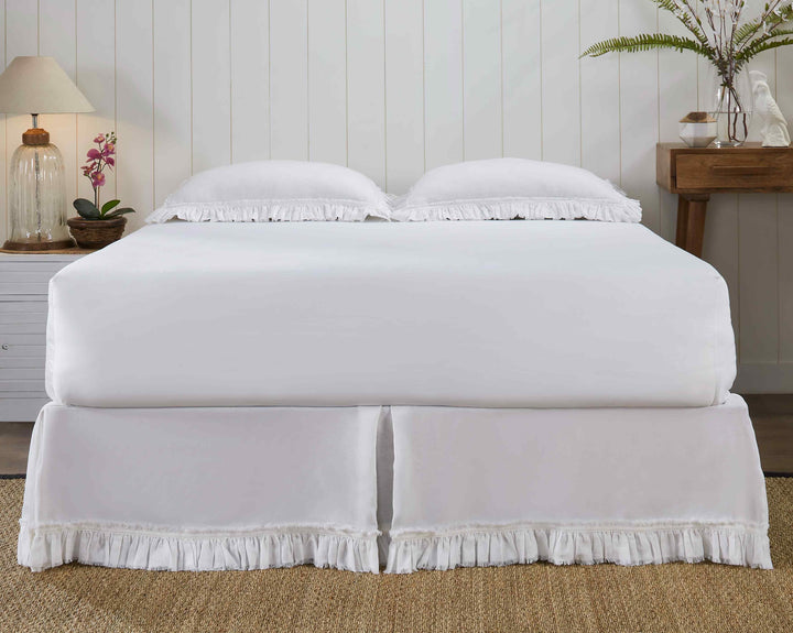 BS-103-6080_2|Full view of a serene bedroom featuring a crisp white linen ruffled panel bed skirt, adding elegant charm to the space.