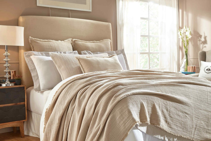 BT-101-11096_3|Cozy beige textured blanket with a crinkled finish and fringed edges, perfect for adding warmth and rustic charm to any bed.