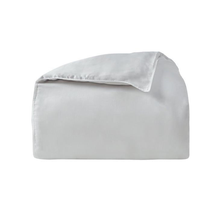 DT-047-9092_5|Neatly folded white duvet cover, showcasing its smooth texture and clean design, ready to elevate any bedroom.