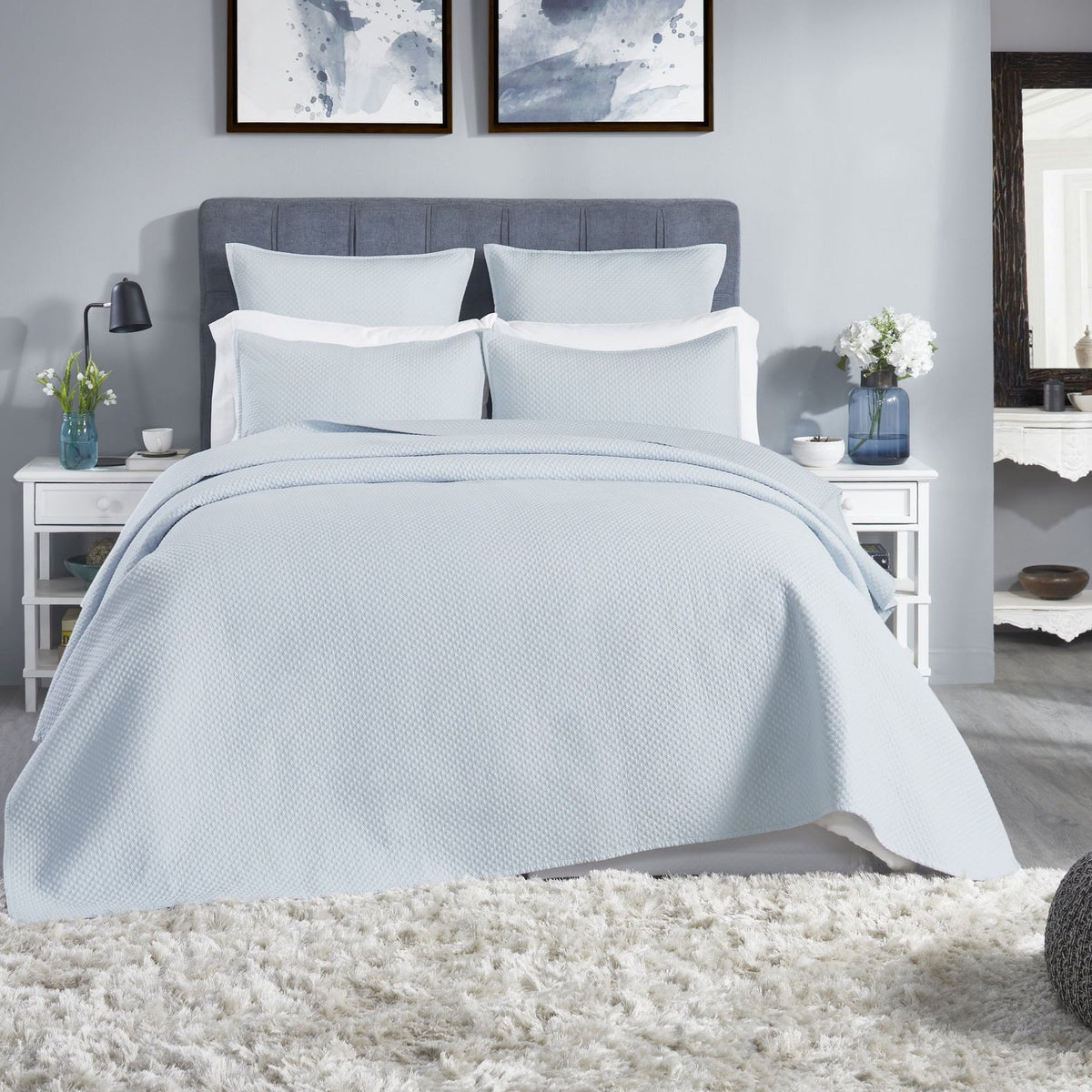 CL-251-11096_1|Light blue textured coverlet on a queen bed, creating a serene and calming atmosphere in a modern bedroom.