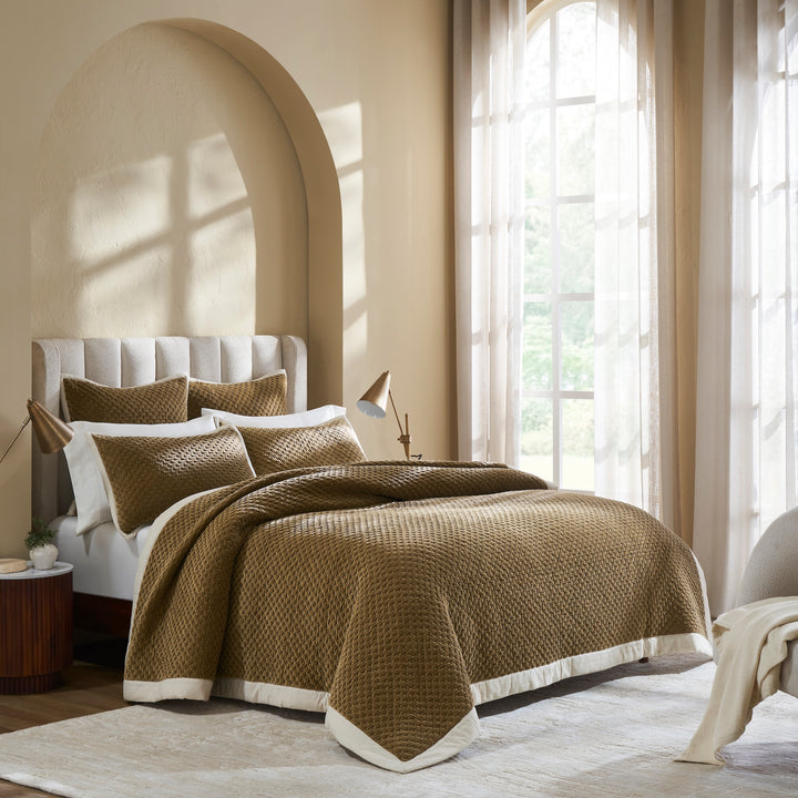 QT-378-9496_3|Luxurious gold textured quilt and matching shams on a king bed, creating a cozy and inviting bedroom retreat. Premium bedding.